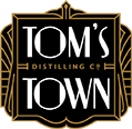 Tom's Town Distillery logo